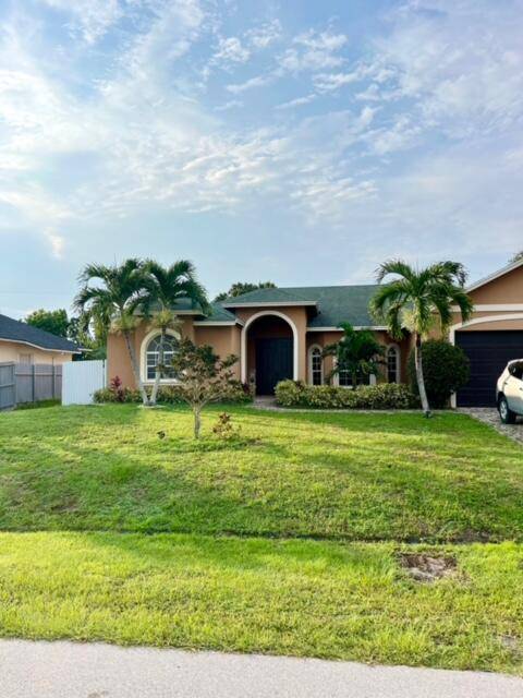Welcome to your dream home in Port St.