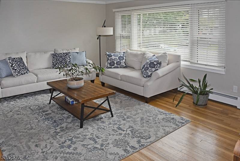 Welcome to 13 Clover Lane, a beautifully updated and well maintained 4 bedroom 2 full bath expanded Cape Cod.
