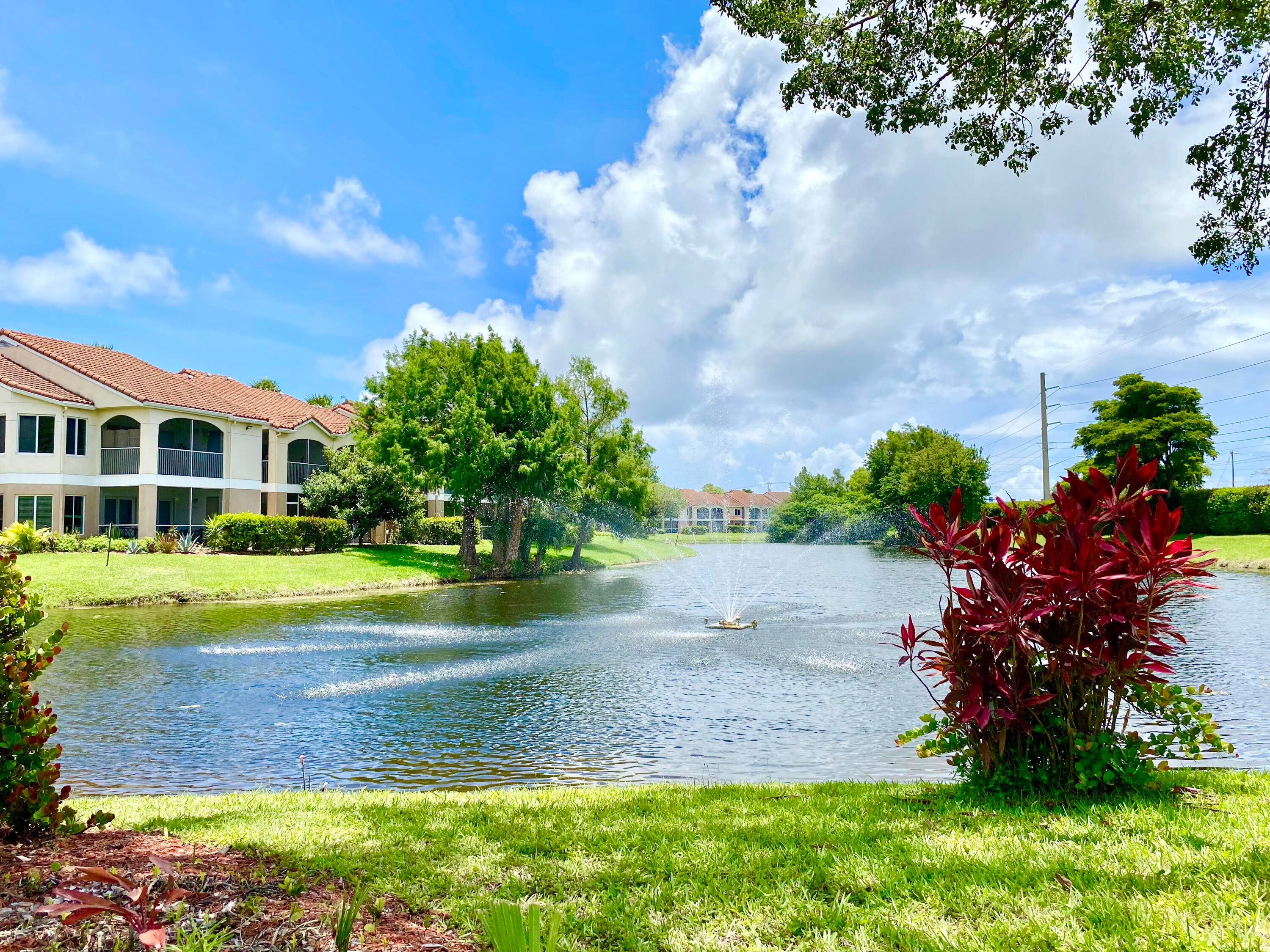 Privately nestled light, bright spacious split floorplan 2nd floor corner unit.