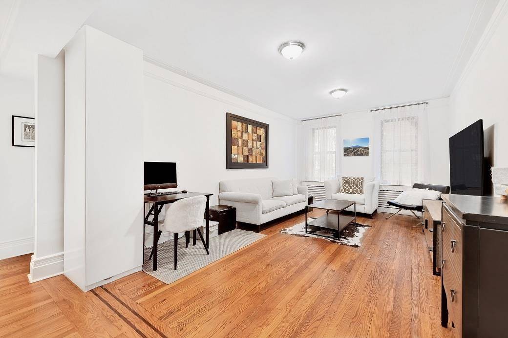 HUGE CORNER SECOND FLOOR ONE BEDROOM for sale in the heart of the Upper East Side.