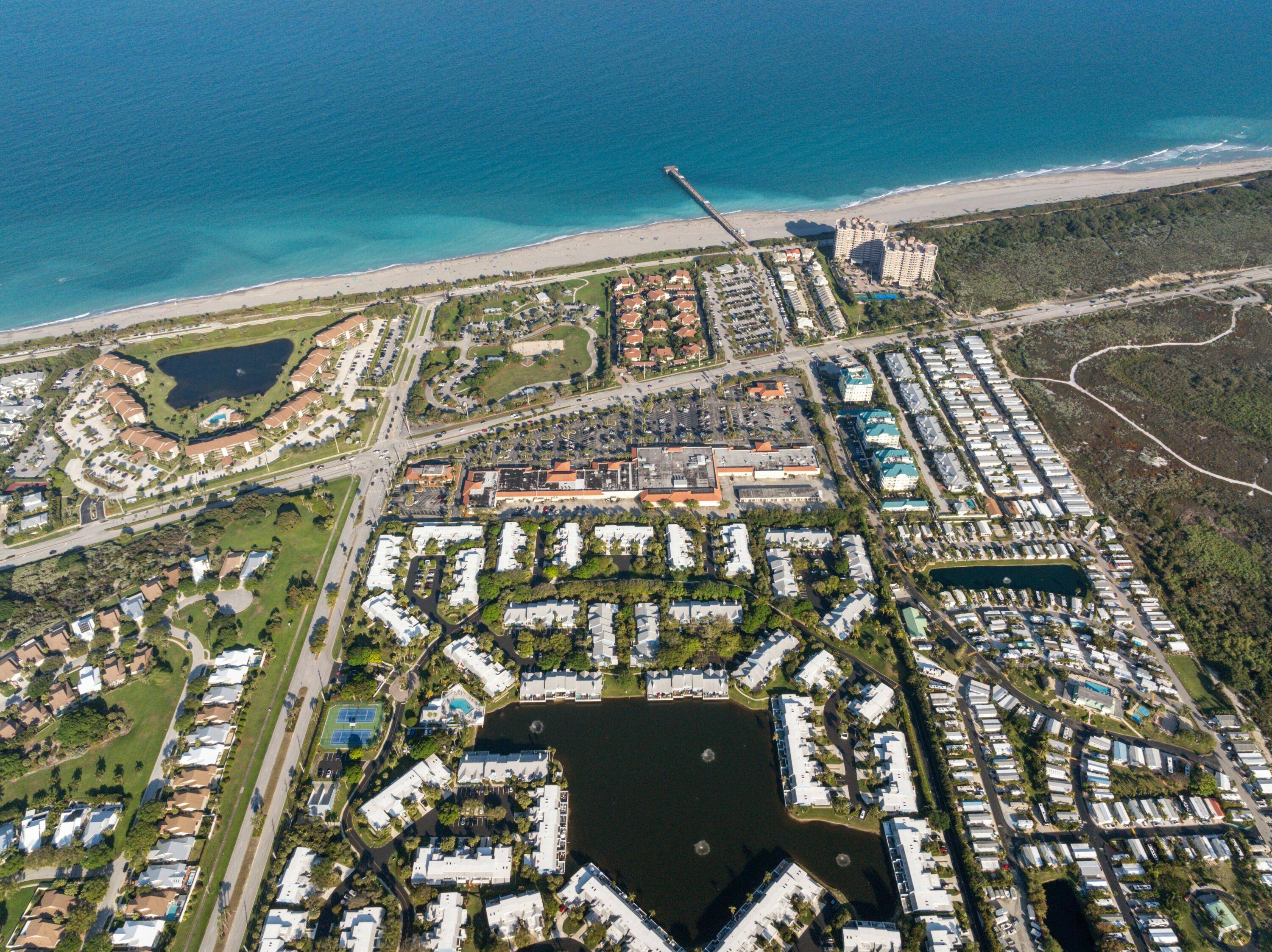 Nestled in the heart of Jupiter, Florida, 210 Ocean Dunes Circle offers an exceptional coastal living experience.