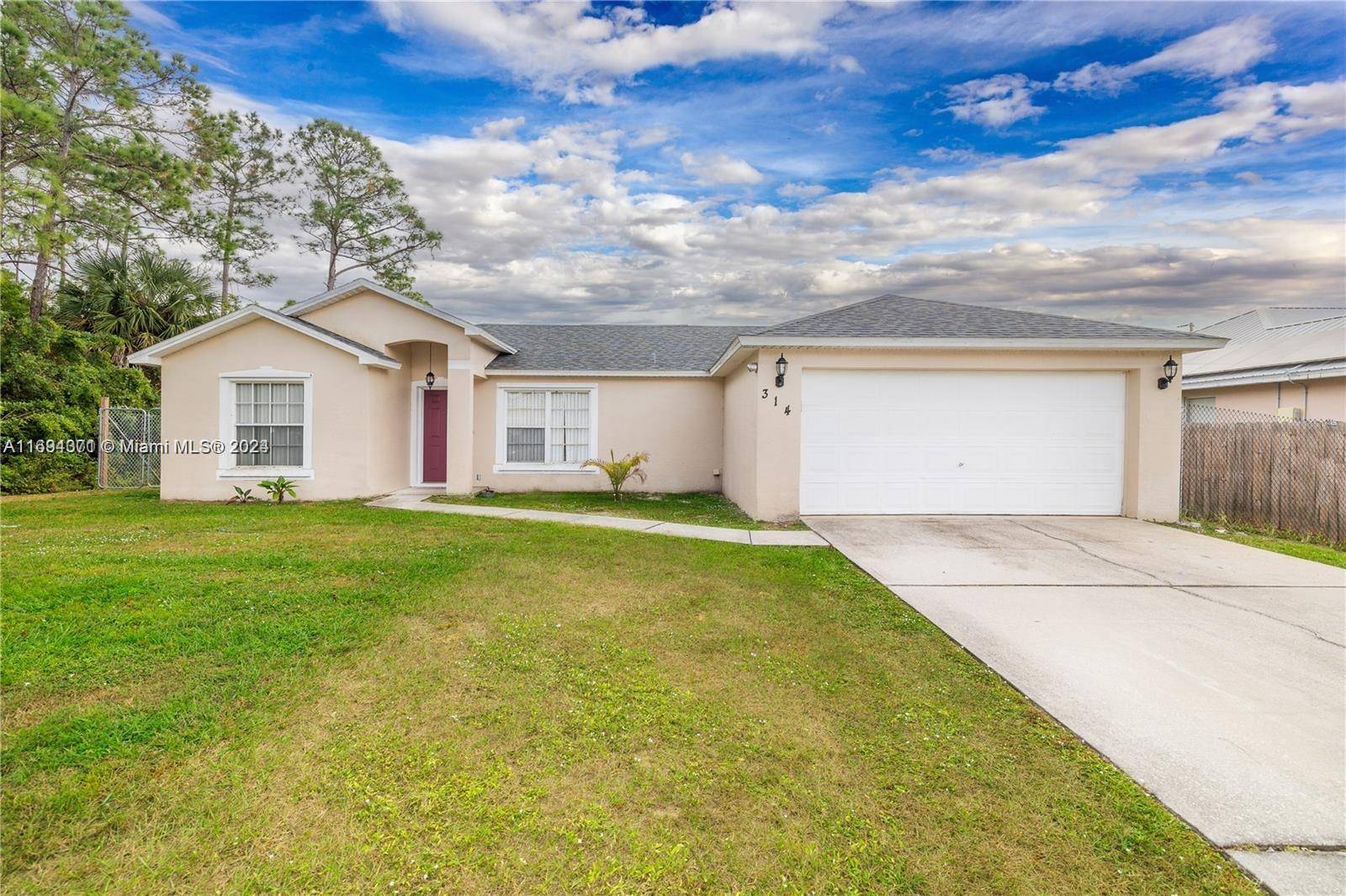 This open single family home features a split floor plan and abundant natural light in a quiet neighborhood.