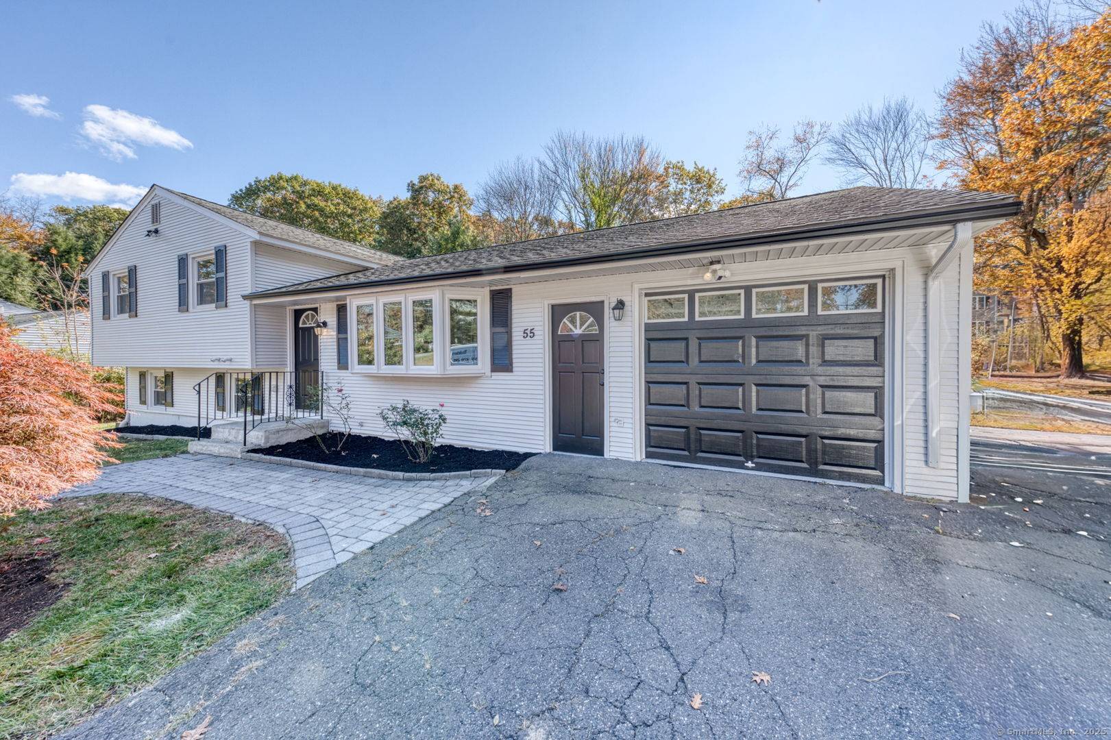 Welcome to 55 Forest Lane, where modern comfort meets classic charm !