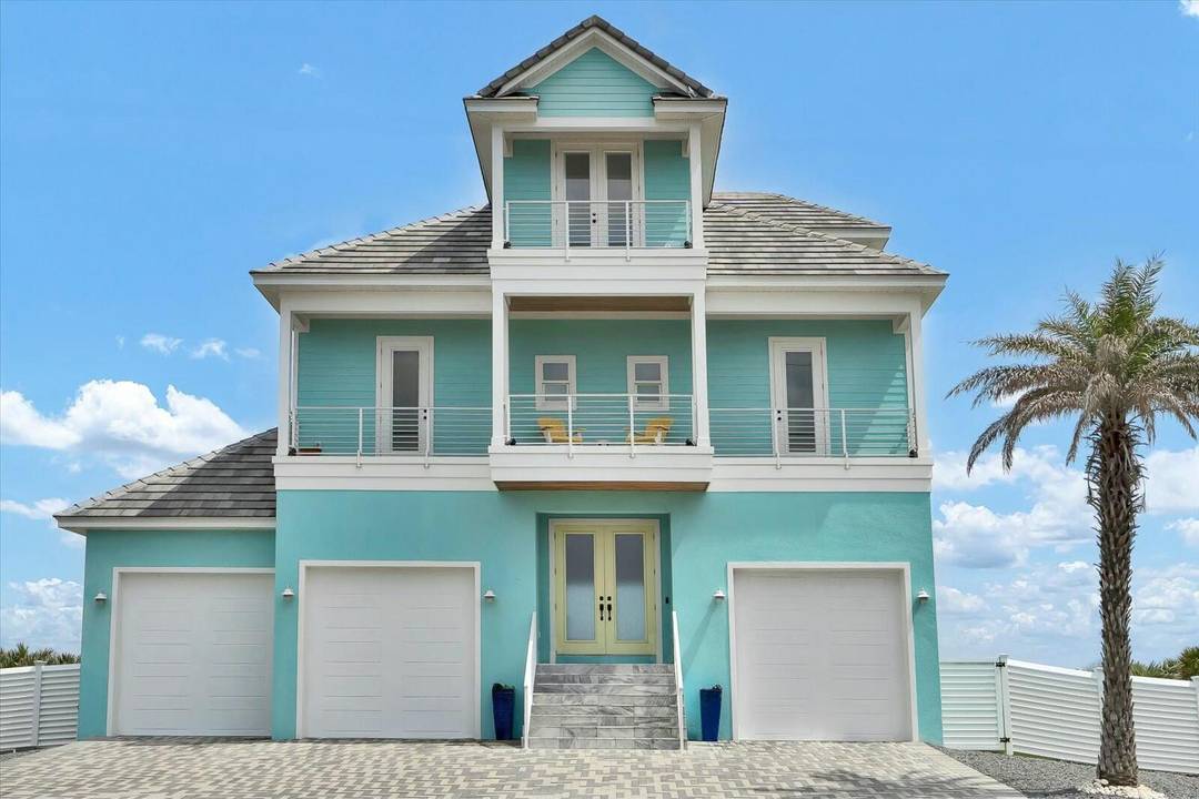 Experience unparalleled oceanfront living in this stunning 3 story home with a private beach walkover.