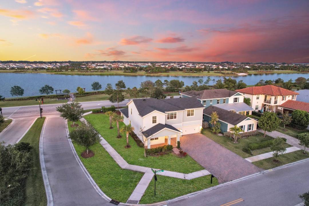 Wonderfully renovated Holly Model on a quiet corner lot, just footsteps away from the lake, walking trails and the playground.