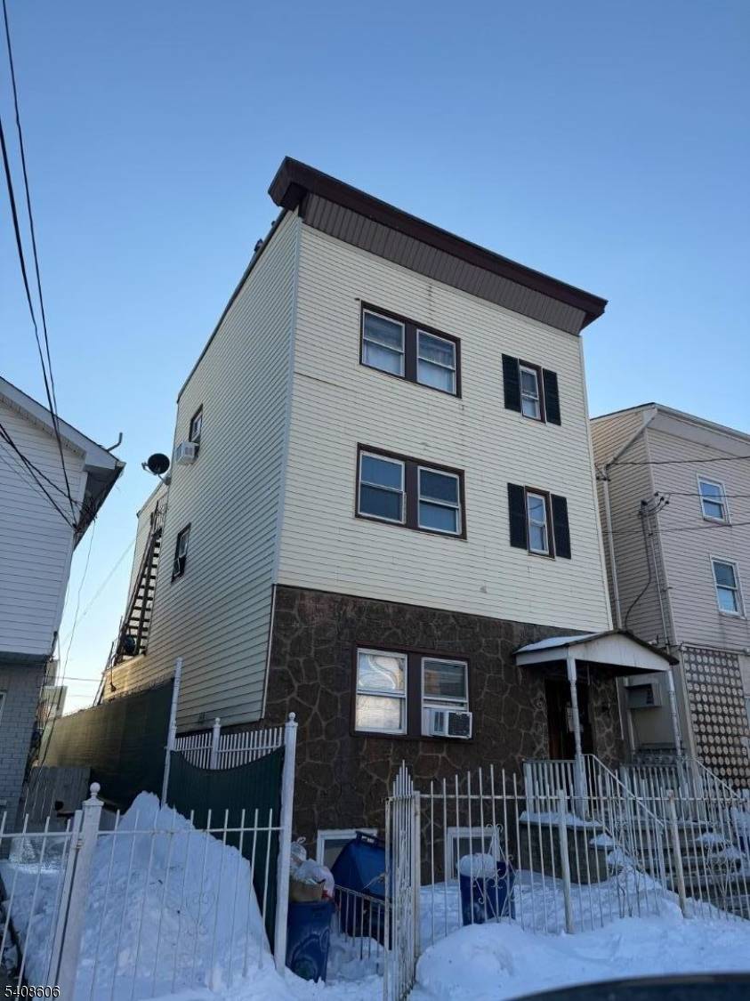 Large three family home located just steps from the lively Ironbound district and minutes from Newark Penn Station, offering unbeatable access to NYC trains and all major transportation routes.
