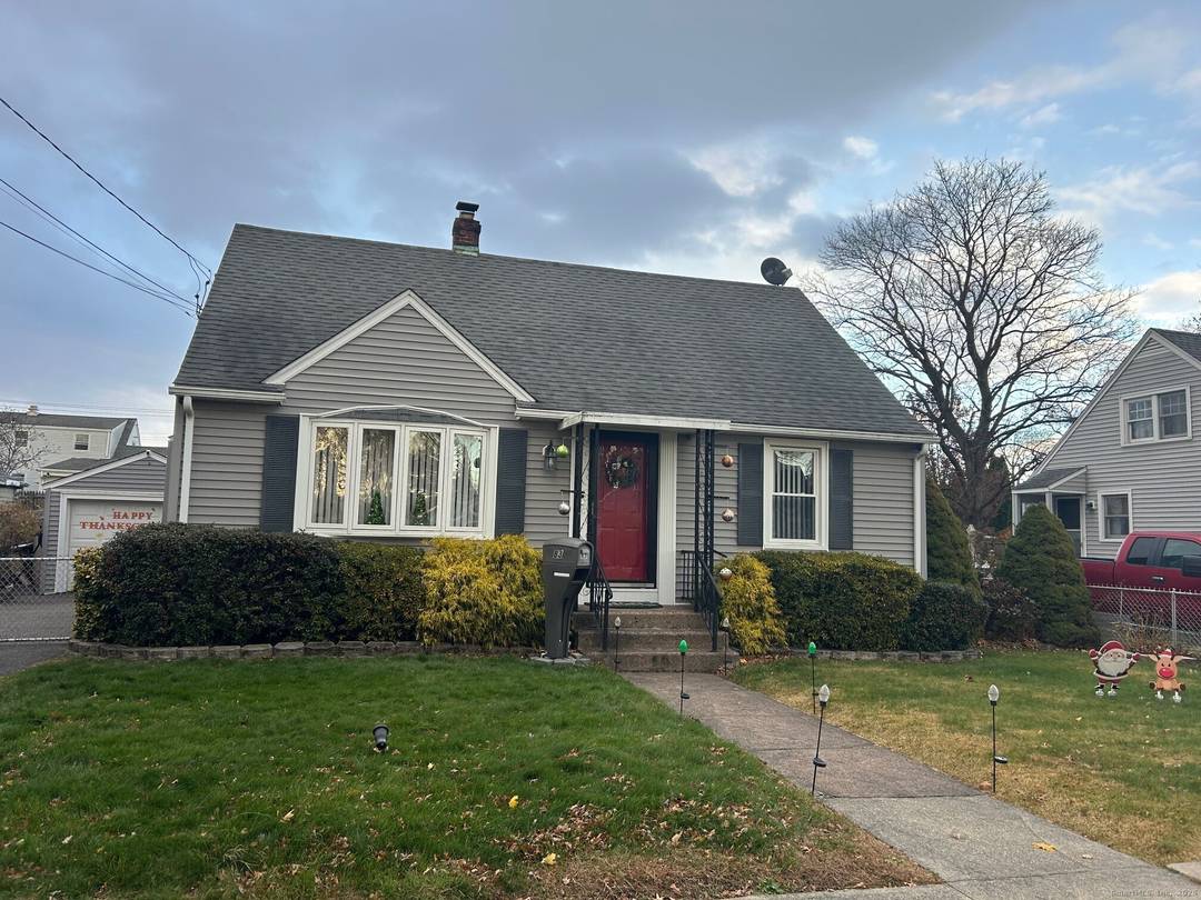 Updated 2 3 BR cape with 2 full baths and 1 car garage.