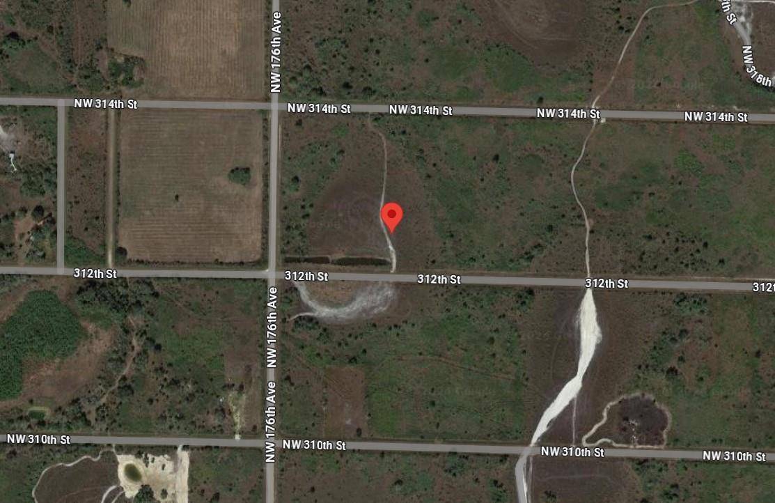 Build or bring your dream home and barn on this beautiful 1.