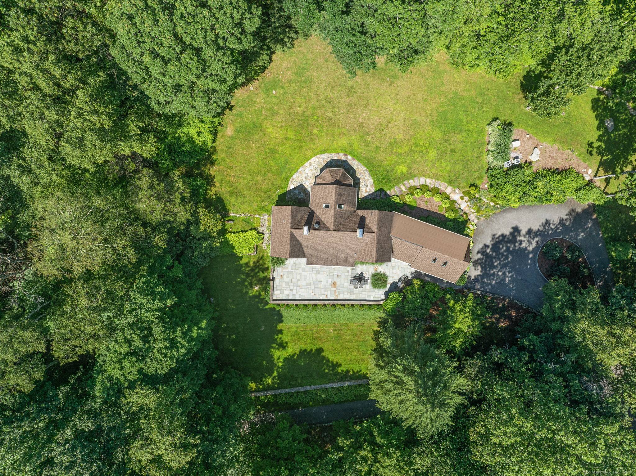 Sculpted from the Earth, Steeped in History This 1931 Frazier Forman Peters masterpiece is a true work of art hand cut fieldstone seamlessly embedded into its hillside perch, embodying strength, ...