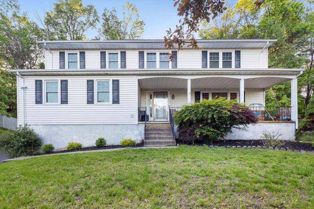 Welcome to this beautifully updated and spacious Colonial, perfectly blending classic charm with modern amenities.