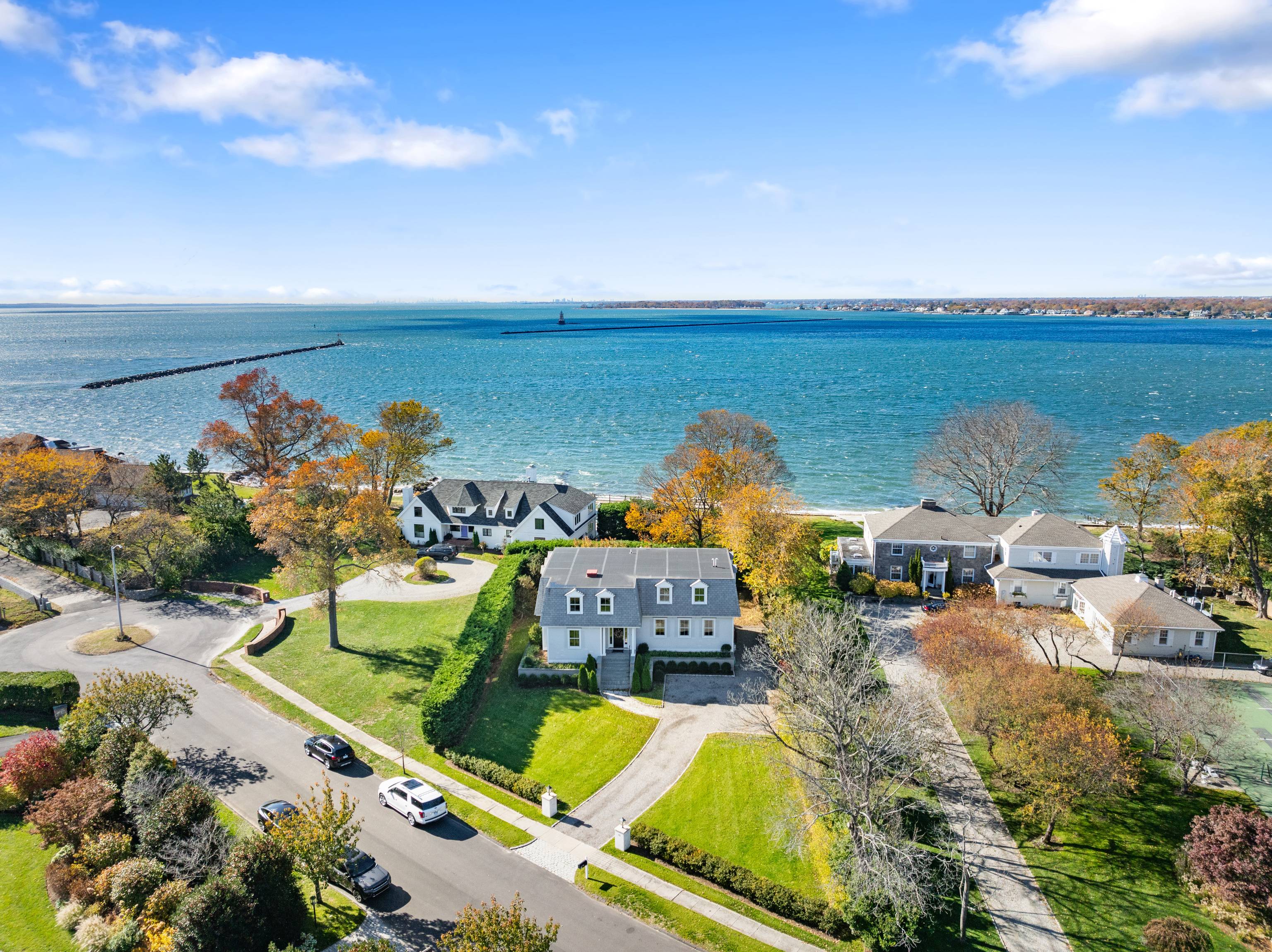 Nestled at the edge of Shippan Point, this stunning coastal retreat offers modern luxury and serene water views just moments from the Long Island Sound.