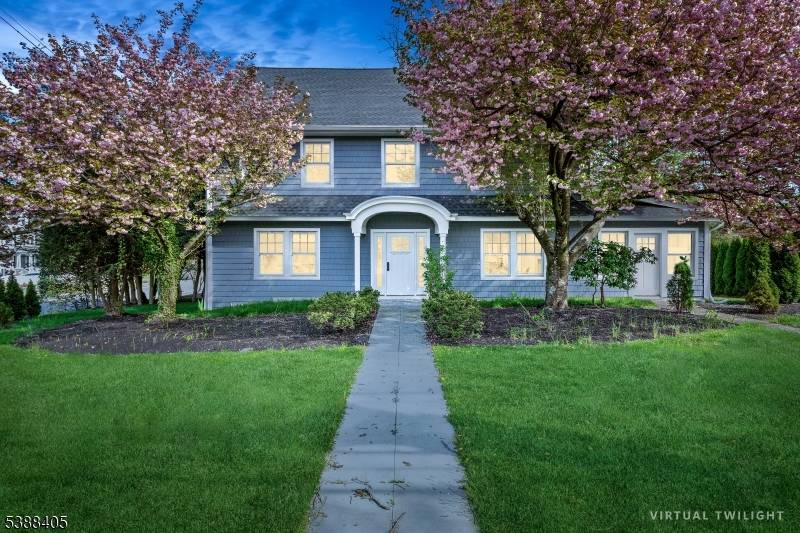 Exquisitely renovated and ideally located just 45 minutes by train to Manhattan, this elegant Center Hall Colonial blends timeless architecture with modern luxury.