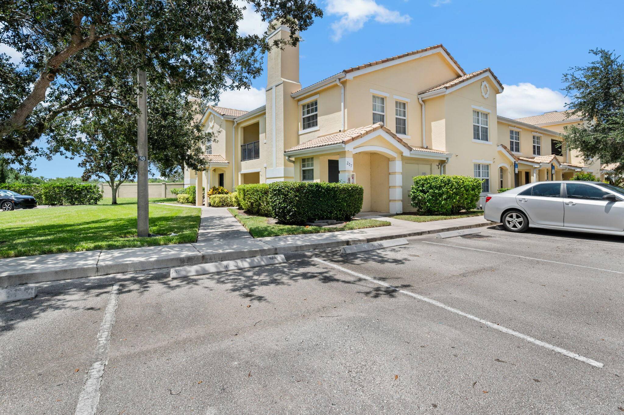 Discover effortless Florida living in this beautifully maintained and fully furnished ground floor condo, located in the desirable Belmont at St.