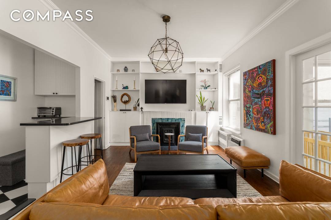 Timeless Pre War Charm in Carnegie Hill WITH VERY LOW MONTHLY MAINTENANCE Discover timeless sophistication and scale in this charming 2 bedroom, 1 bathroom co op blending Upper East Side ...