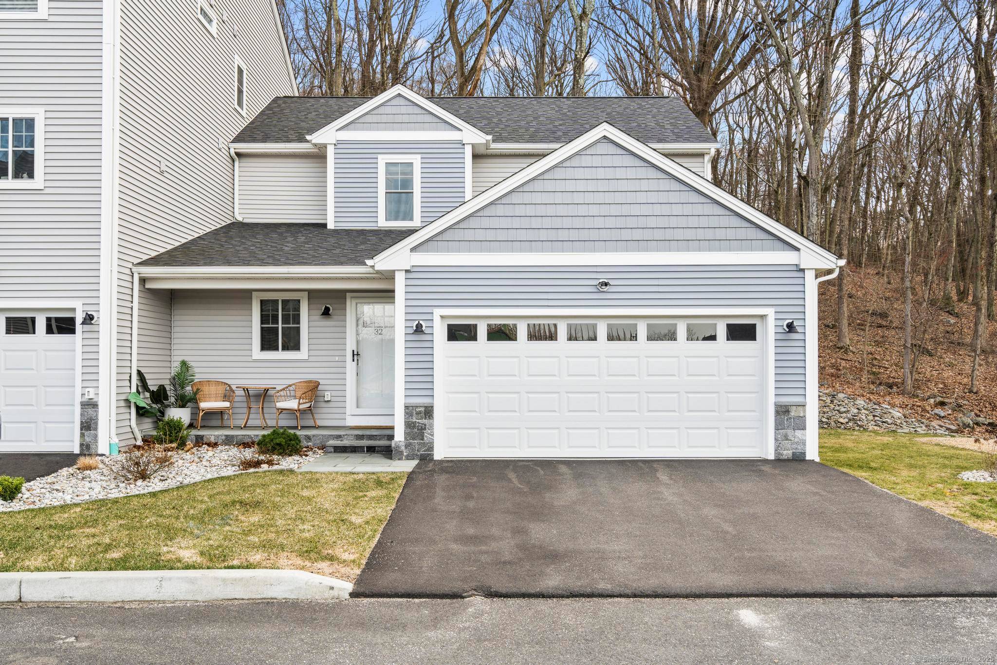 Welcome to 32 Spindrift Lane, a beautifully appointed end unit townhouse in Shelton's sought after Daybreak Ridge community.