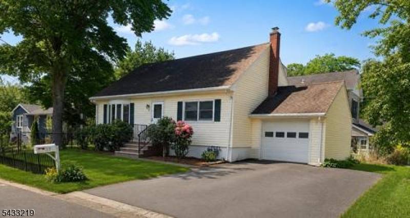 Beautiful corner Cape Cod house featuring 4 large bedrooms and 2 full baths.