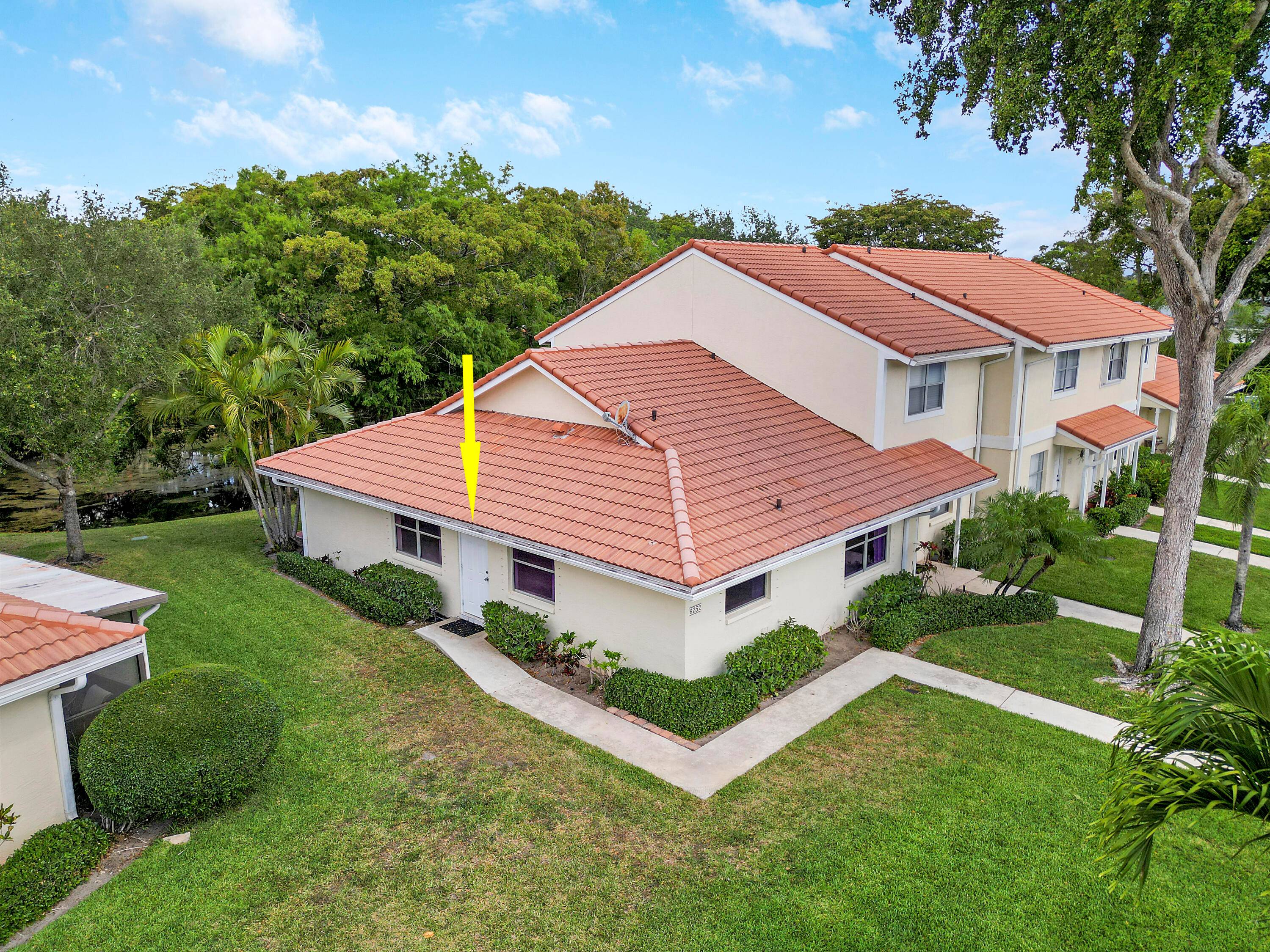 Experience refined living in this beautifully renovated 2 bedroom, 2 bathroom corner villa with tranquil lake views in the sought after Boca Walk community.