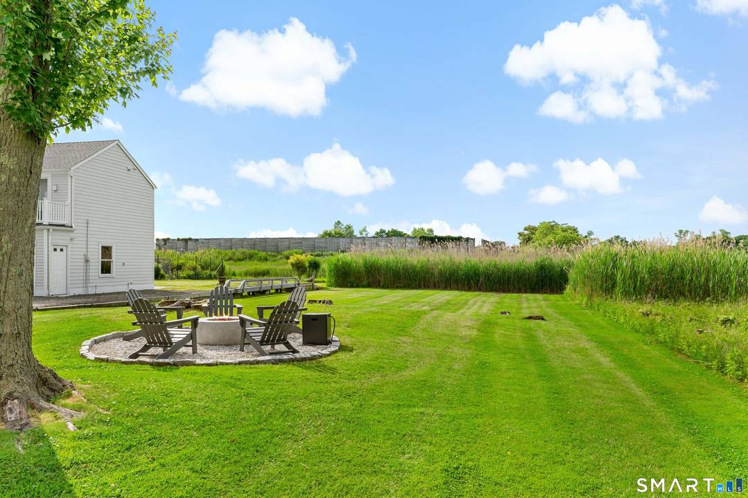 Experience the best of coastal living at 1016 Fairfield Beach Road, a quintessential beachside retreat perfectly positioned for an unforgettable summer.