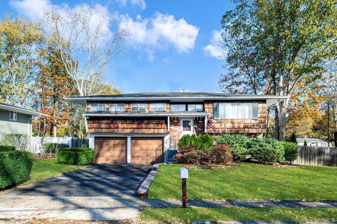 Step into a piece of history with this captivating 1960s hi ranch home, a true gem that combines mid century charm with modern comforts.