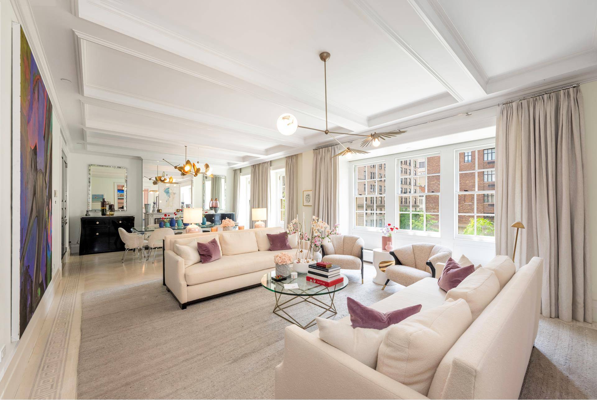 Experience the epitome of luxury living in this meticulously designed full floor prewar condo on Park Avenue, designed by the renowned decorator Sara Story.