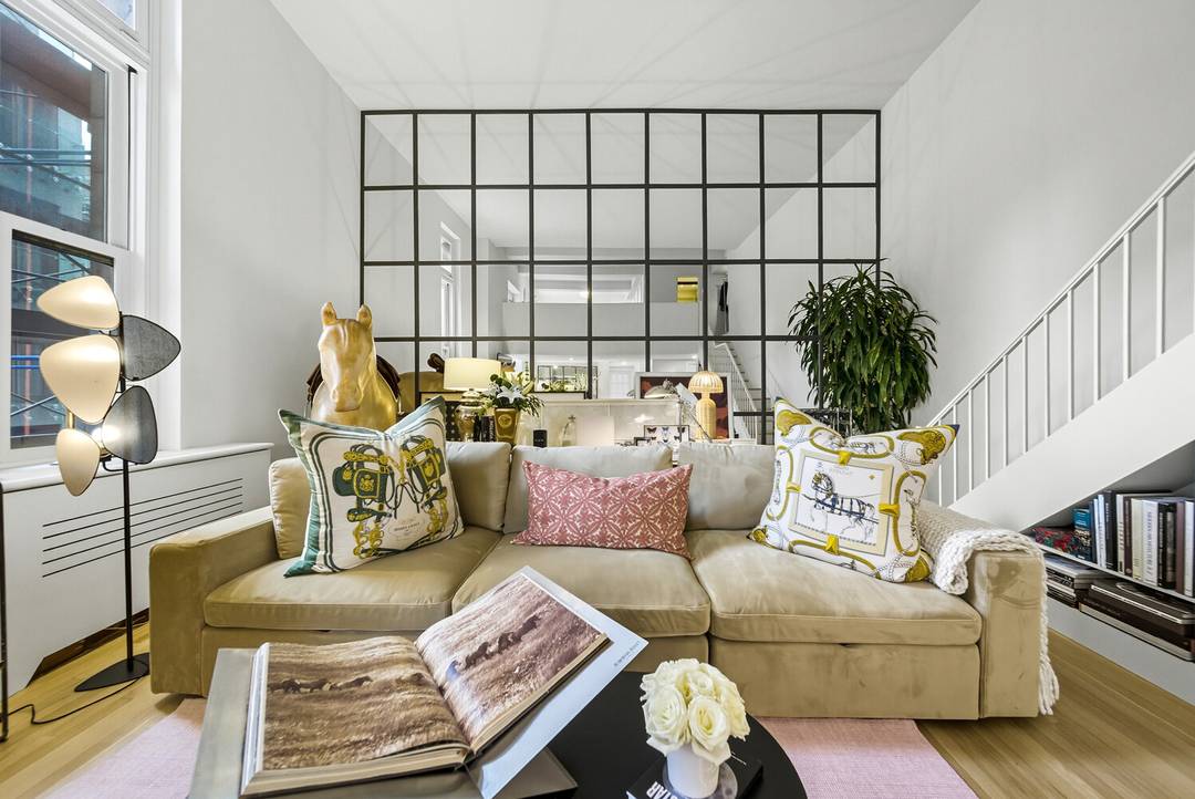 This rare loft style one two bedroom residence combines Parisian elegance with downtown grandeur.