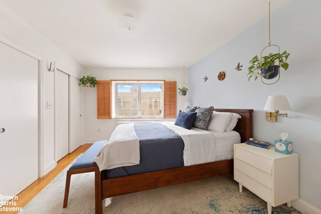 Sunny, modern top floor 2 bedroom, 2 bath condo in the heart of Hudson Heights.