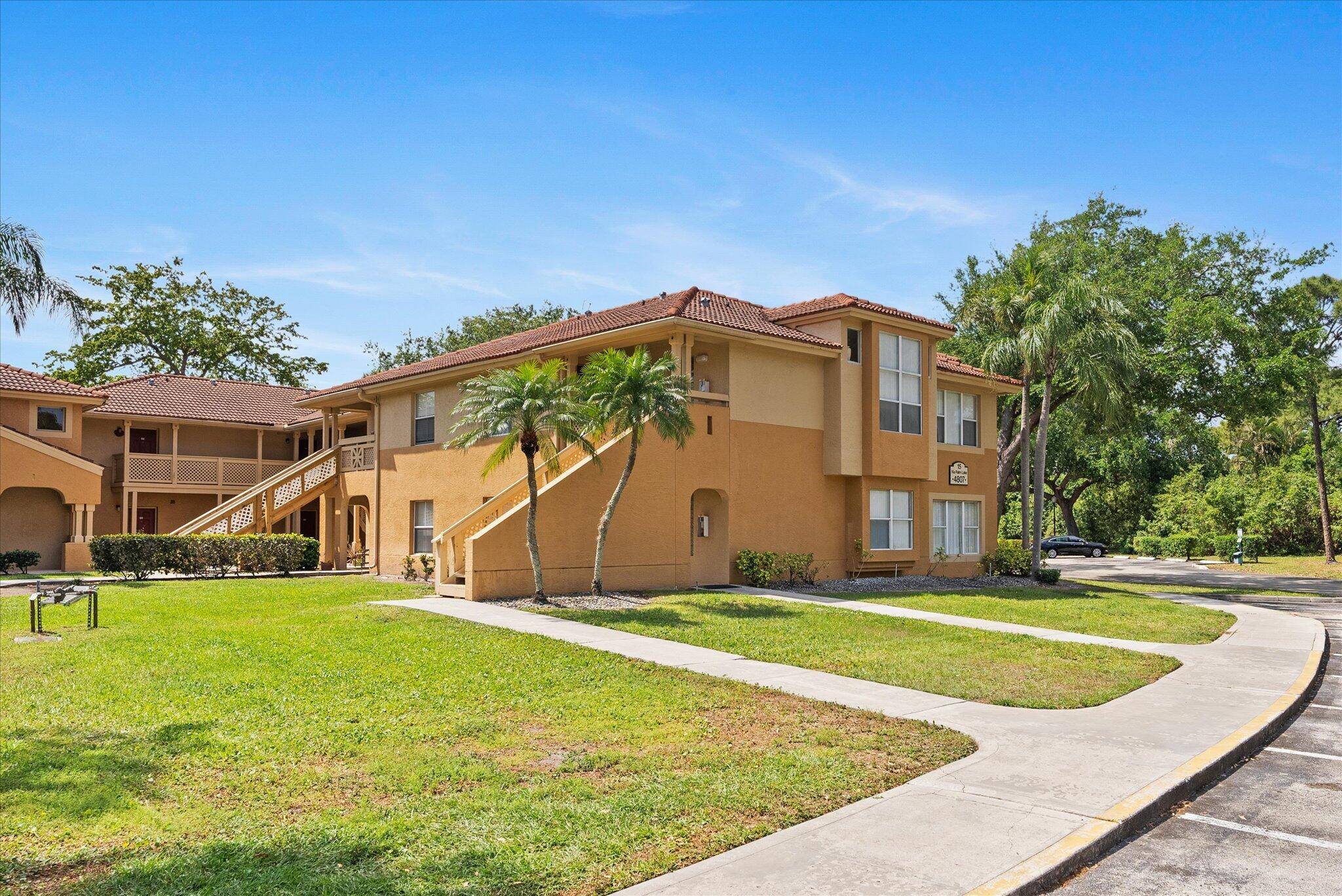 Welcome to this bright and airy condo in the gated community of Palm Lake.