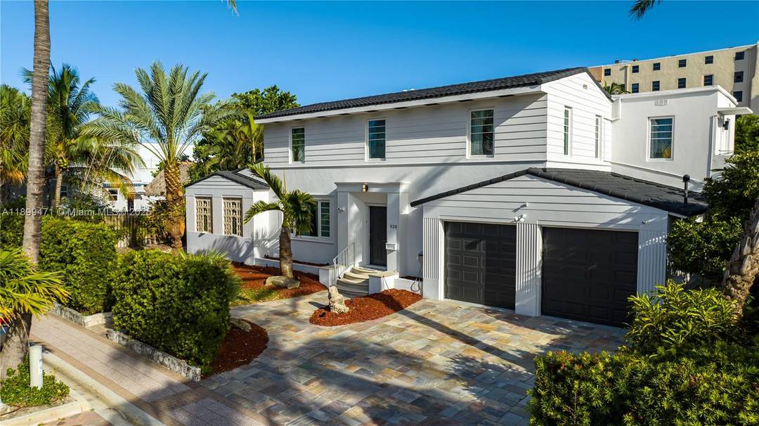 Live steps from the sand in this bright and spacious 6 bedroom, 4 bath home perfectly positioned near Hollywood Beach.