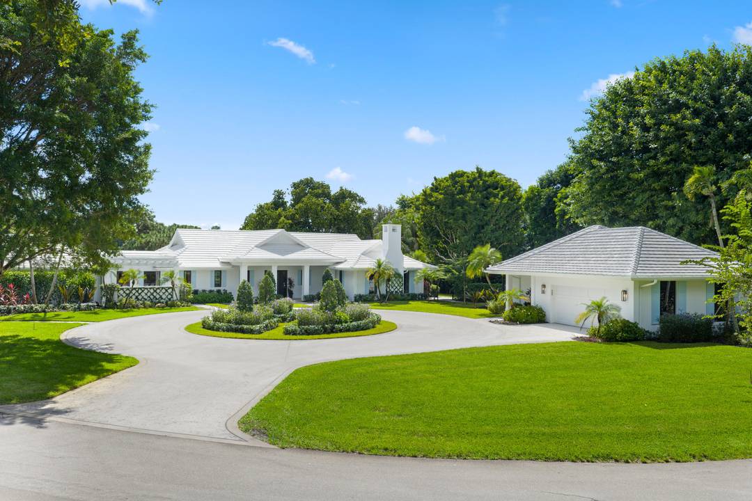 Thoughtfully designed with Bermuda Royale exterior detailing and refined Coastal Moderne interior finishes, this one of a kind custom home offers elegant living with exceptional attention to detail.