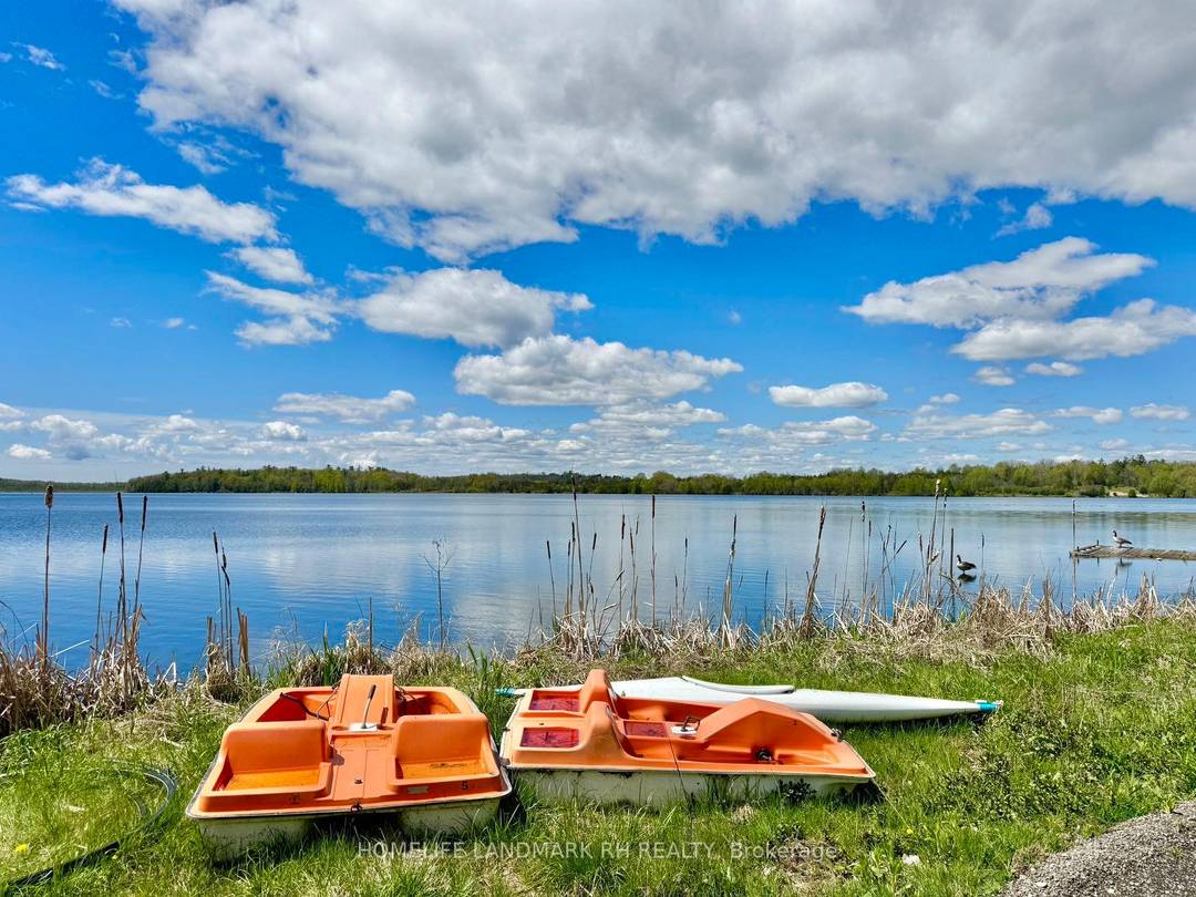 Early Bird Pricing ! Beautiful lakeside vacation rental on Rice Lake on private property w over 500 Feet of lake frontage !