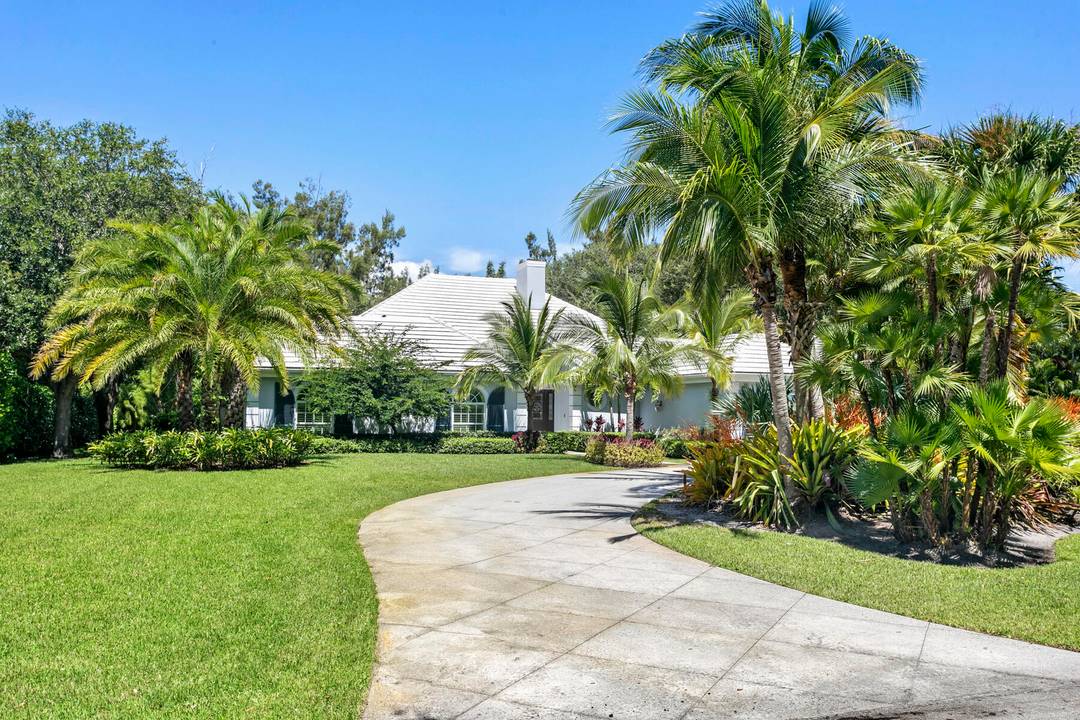 Stunning 5BD 3. 1BA coastal contemporary home in exclusive Seminole Landing, a gated community with 24 hour security, private beach access, golf cart friendly streets, and tennis courts.