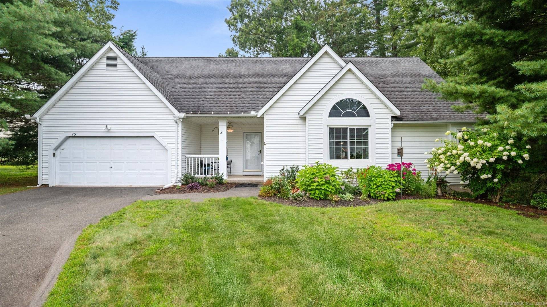 Private and Sunny Nestled at the end of a cul de sac in a woodland setting, natural light streams though large windows in this smartly designed home.