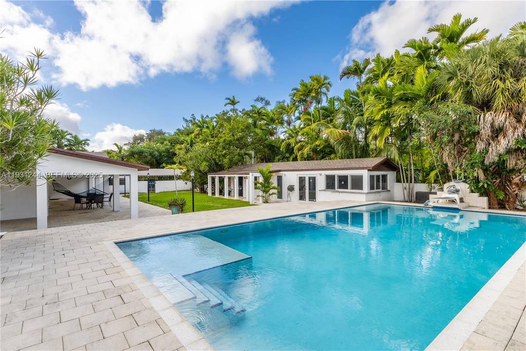 Large two story home built in 1925, offering classic architectural character, high ceilings, abundant natural light, and spacious bedrooms and bathrooms.