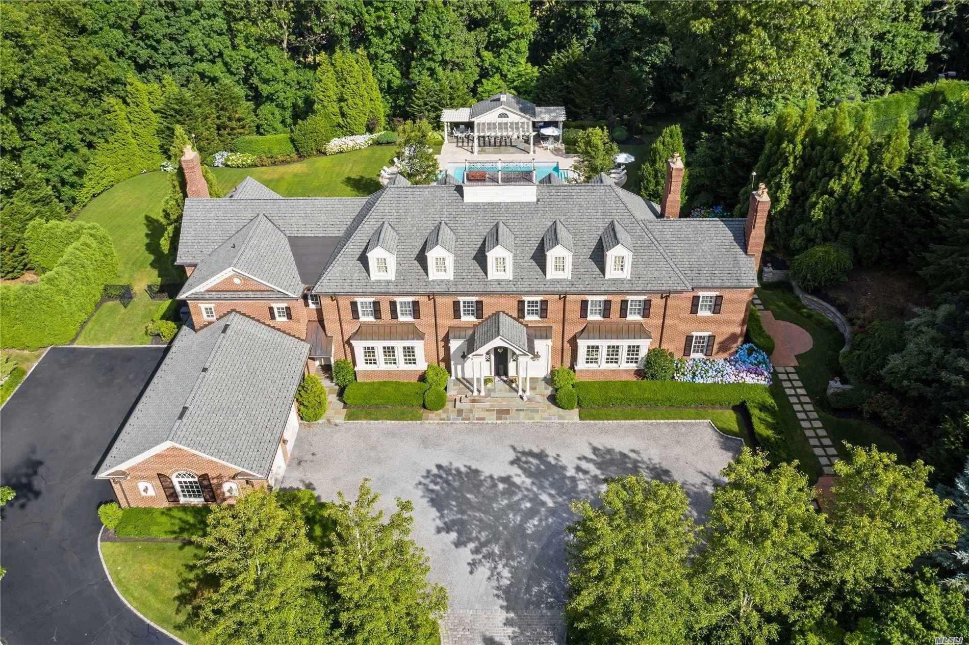 Exquisite Custom Built Turn Key Estate, Radiant Heating, White Oak Floors, Custom Built Thick Molding Throughout.