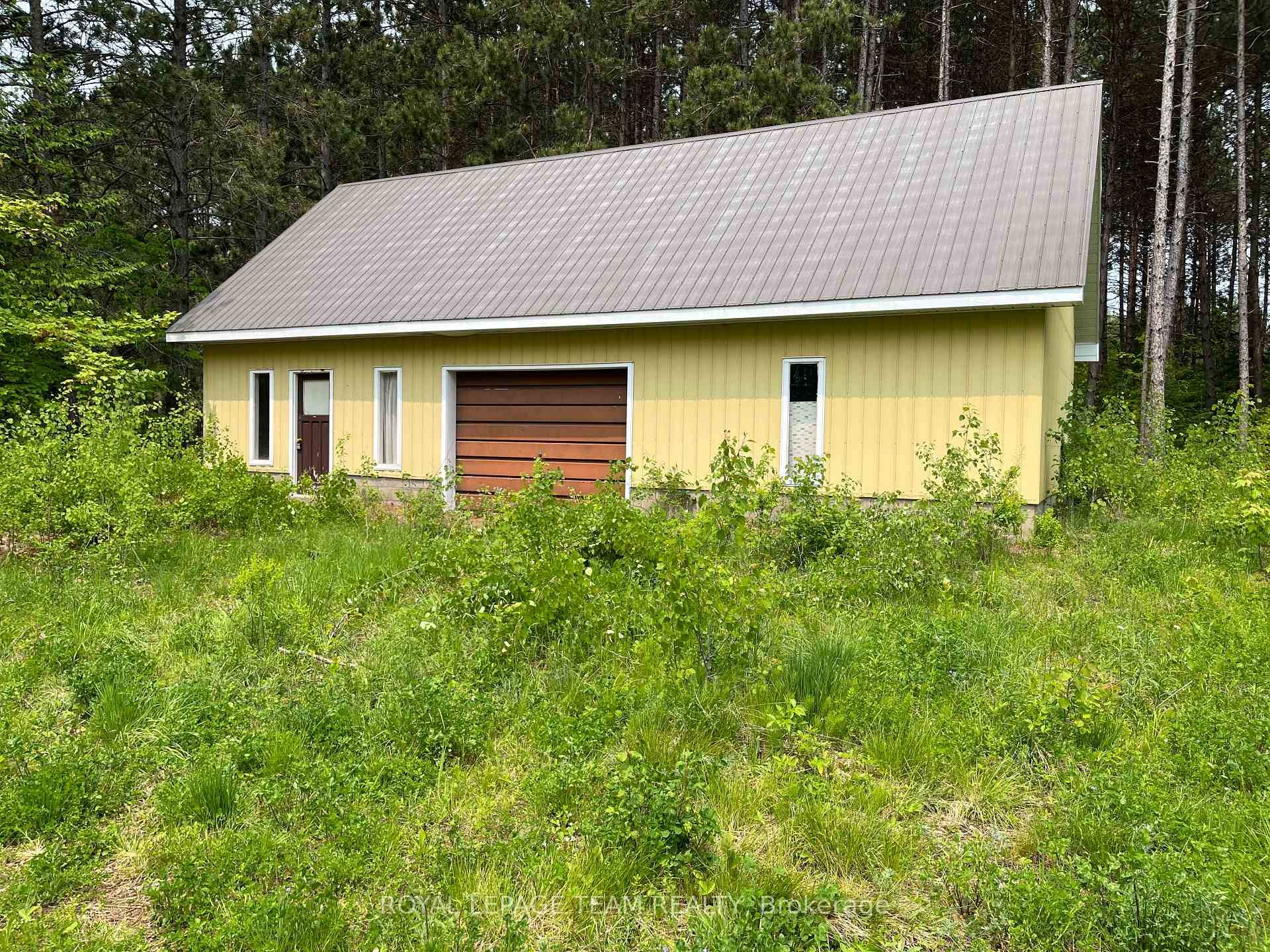 Excellent one acre building lot located just outside of town close to all amenities.