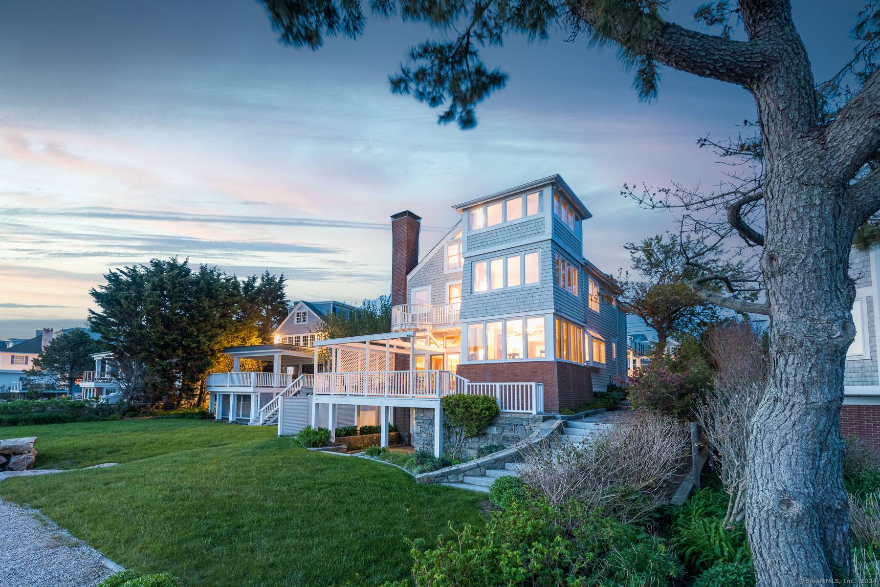 Ideally located in the Borough of Stonington, this four bedroom, three and a half bathroom multilevel home has 50 feet of water frontage and a dock.