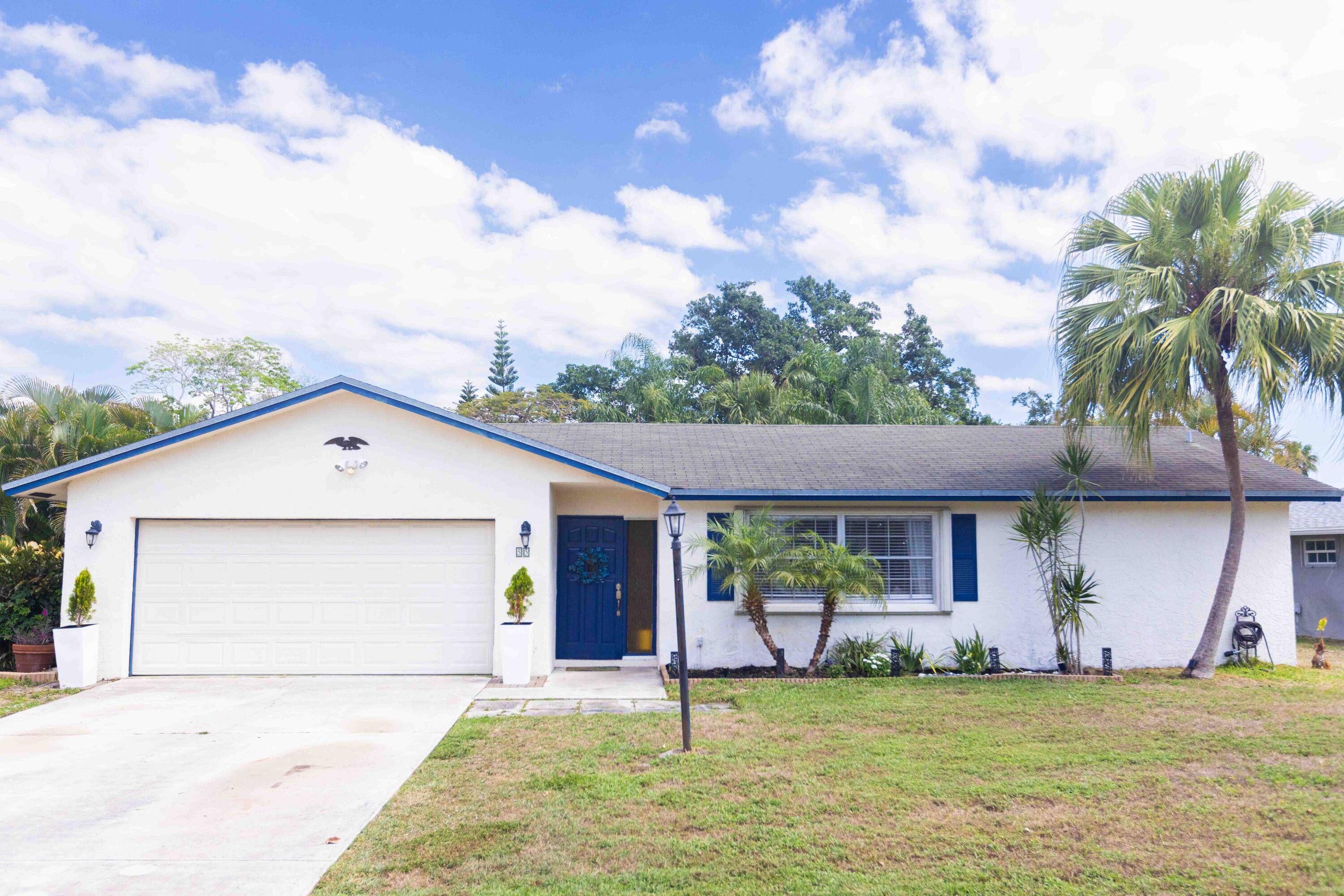 Welcome to Paradise ! 3 2 2 pool home in tropical paradise on just under a half an acre with NO HOA in Florida Gardens !