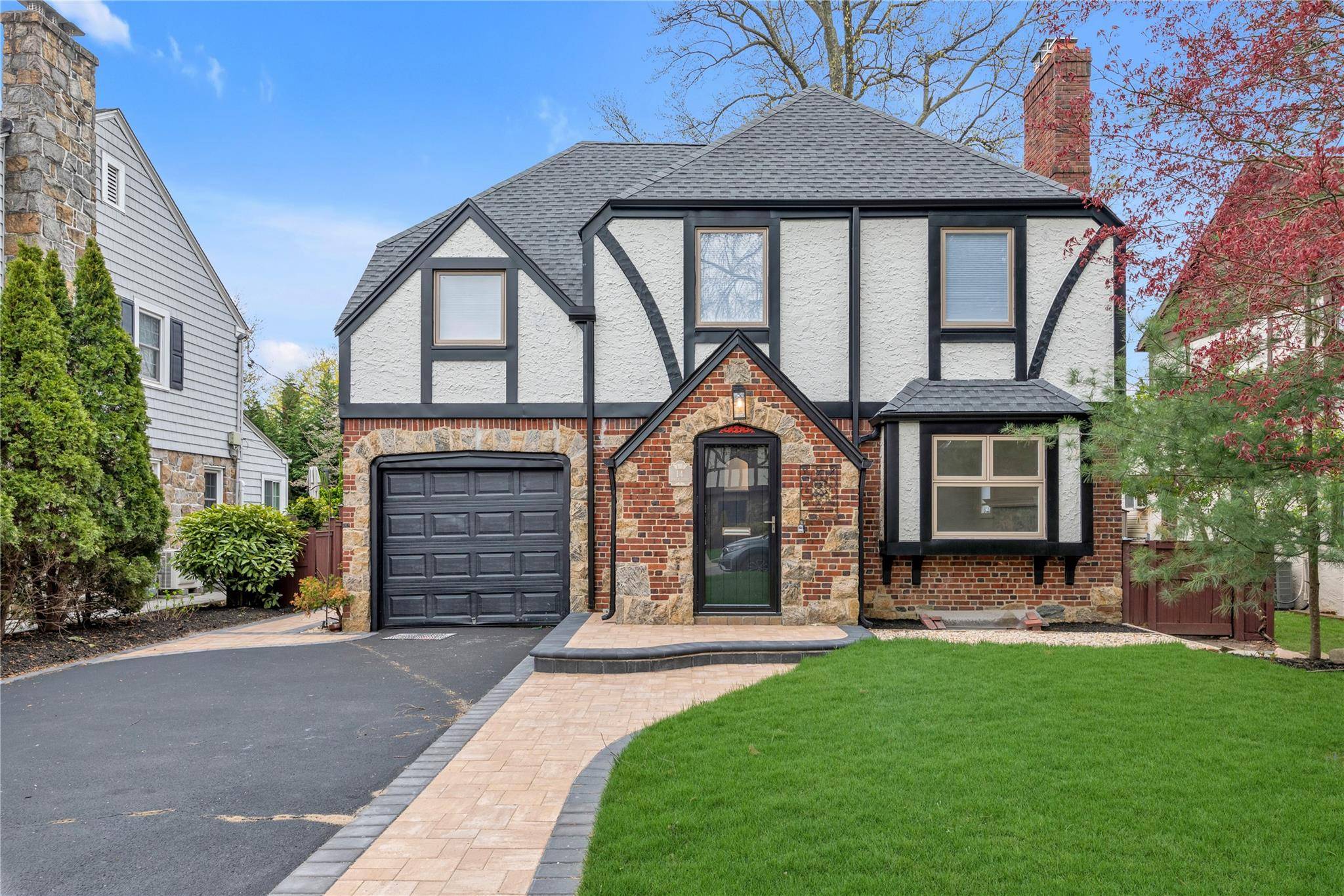 This classic brick renovated Tudor style home is located in the heart of Rockville Centre Village and awaits it's new owner.
