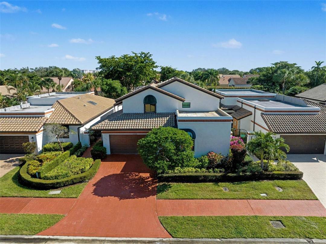 Experience elevated luxury in this fully renovated 3 bedroom, 2 bath home located in the exclusive gated community of Villa Flora at Boca Pointe.