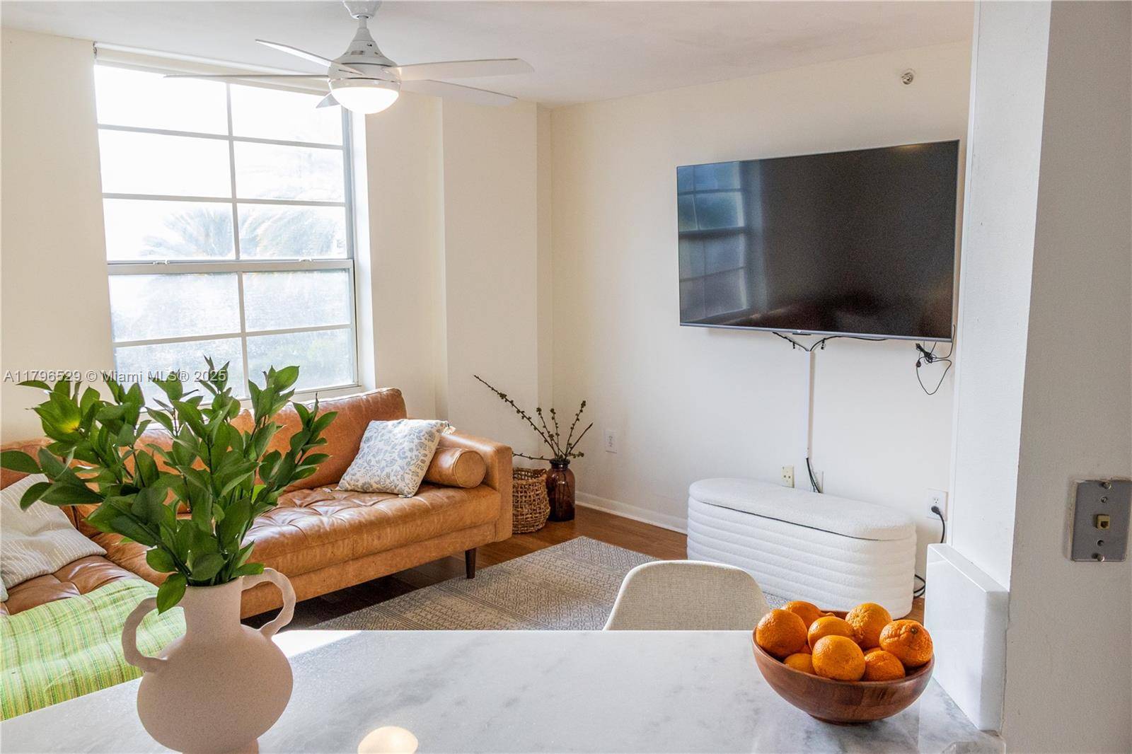 Light filled 3 bed, 2 bath corner unit den with wood floors.