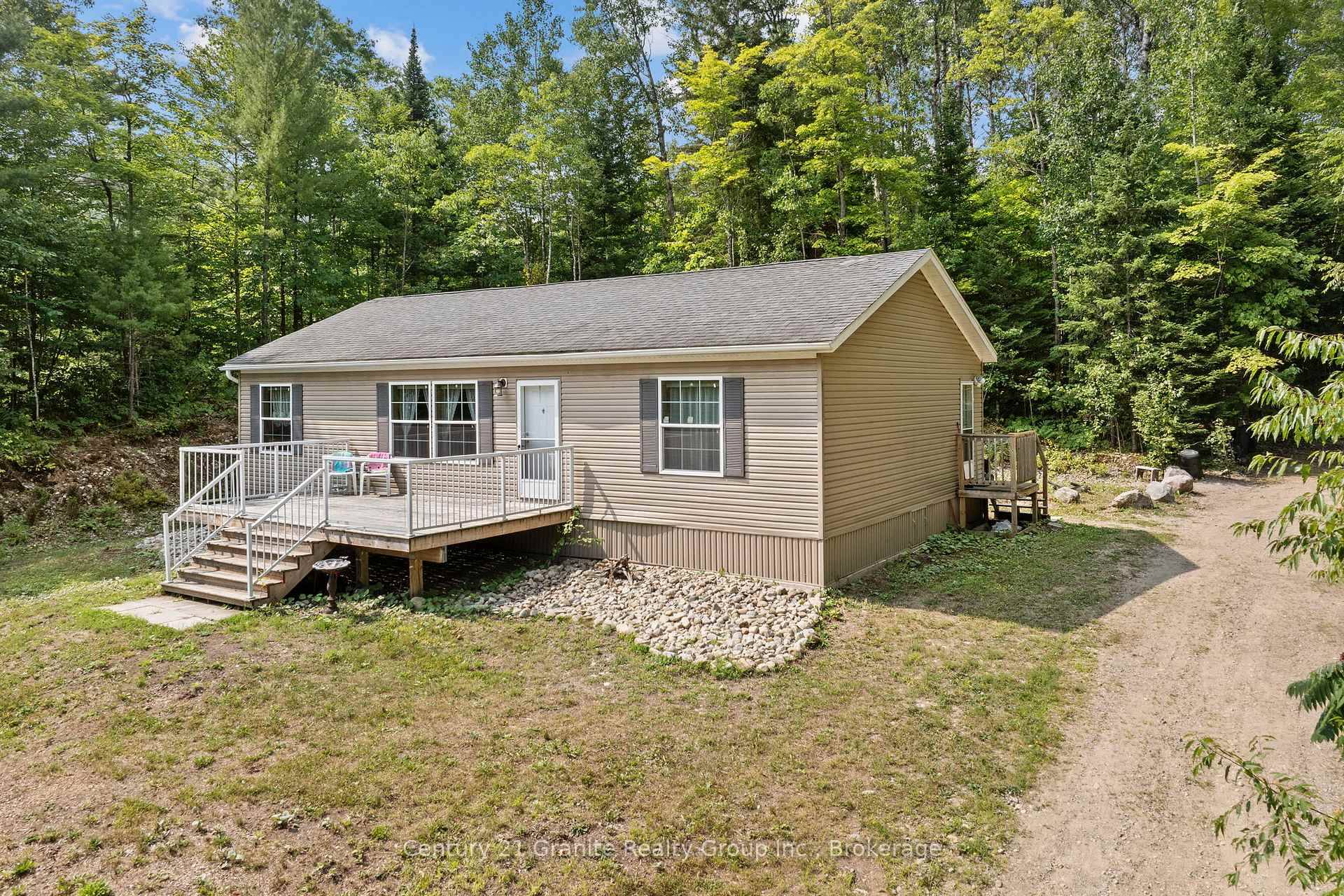 Nestled on a scenic knoll overlooking picturesque Pivot Lake, this charming 8 year old country home offers the perfect blend of comfort, convenience, and natural beauty.