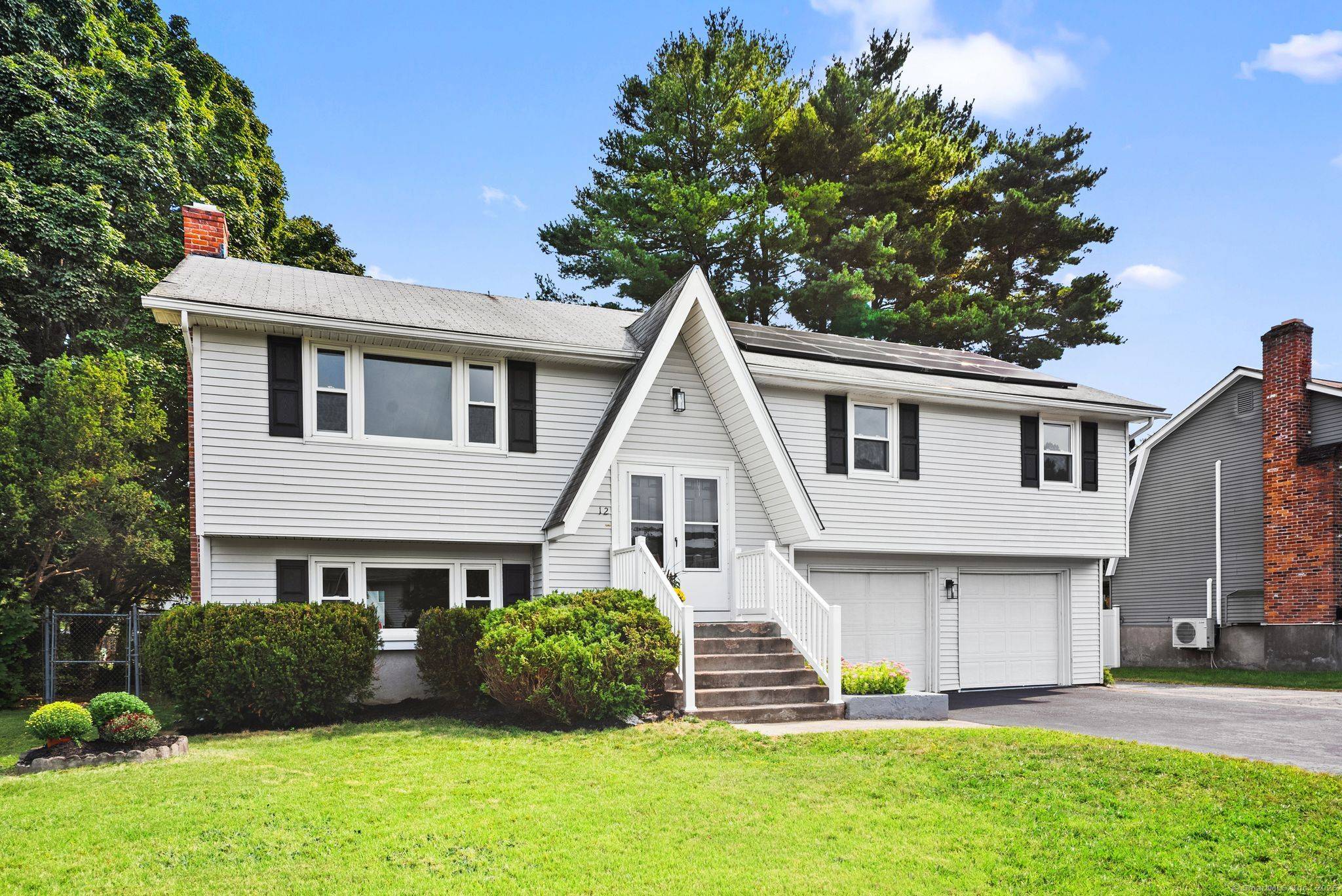 Step into this newly renovated gem at 12 Carpenter Drive in East Hartford.