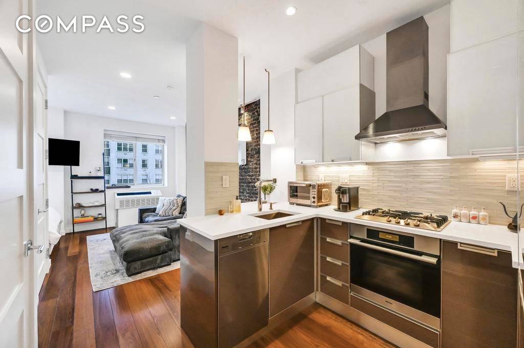 Triple mint alcove studio in a boutique elevator condo.