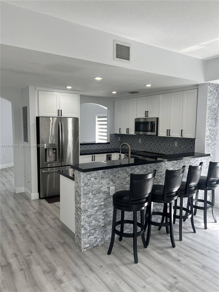 CENTURY PARC TOWNHOME COMPLETELY RENOVATED.