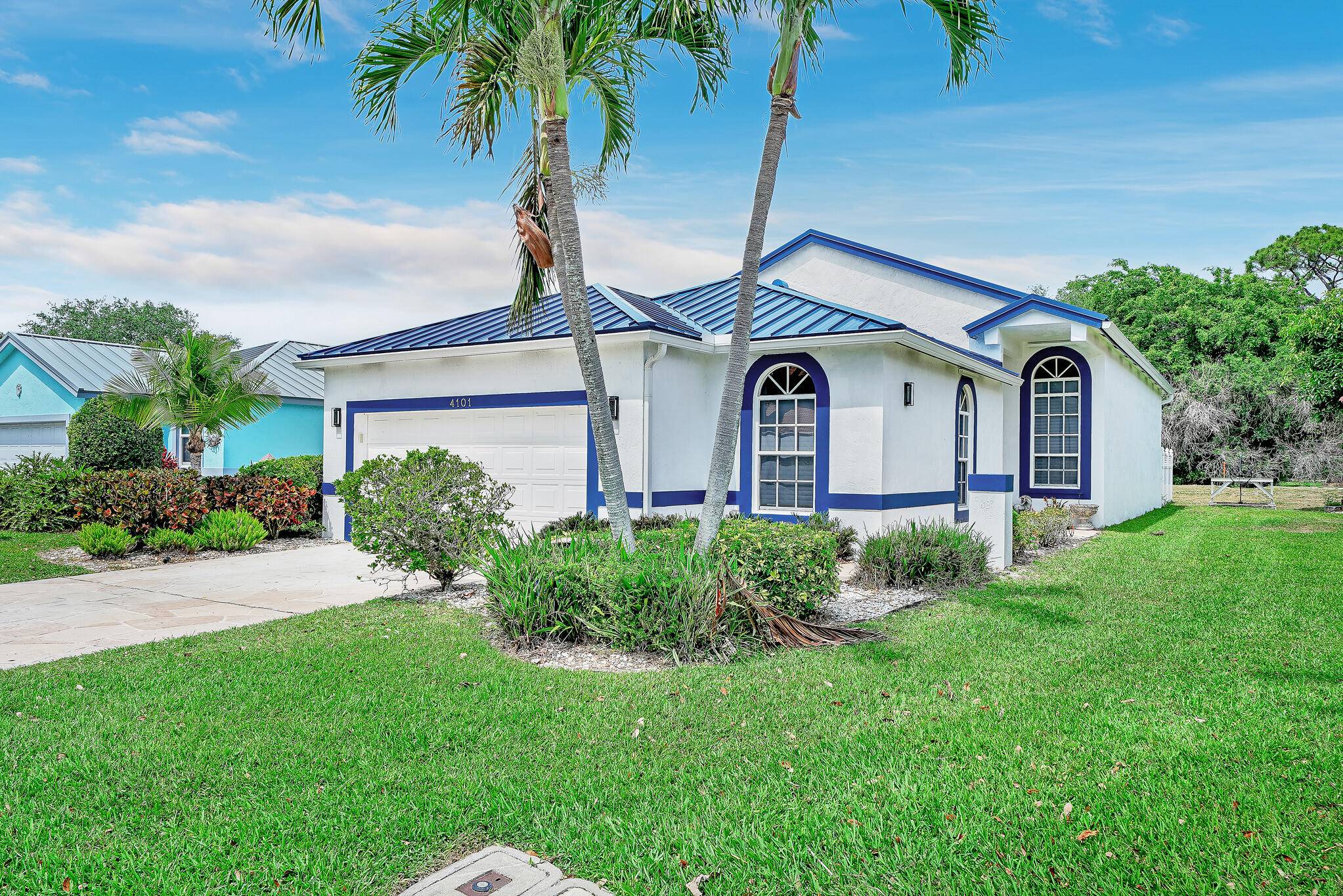 This charming home features a brand new metal roof installed in 2024, a spacious kitchen complete with granite countertops, maple cabinetry, and a beautiful tumbled marble backsplash.