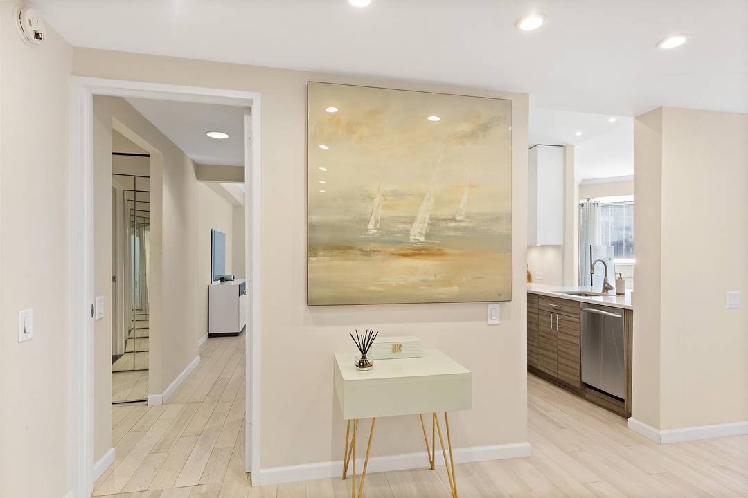 This stunning one bedroom and one and a half bathroom condo with a private balcony is being offered at the CitySpire building in Midtown West.