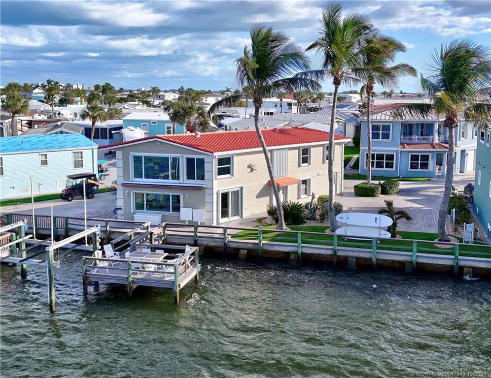 LARGE DOUBLE WATERFRONT LOT with a Large Island home located on Nettles Island Resort.