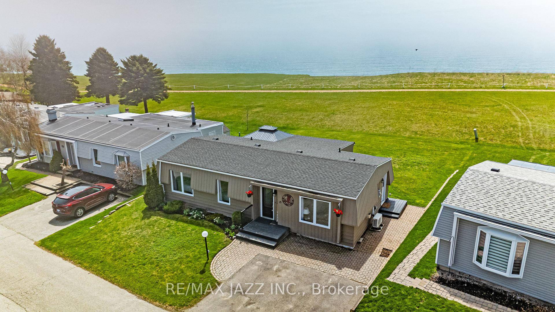 Welcome to carefree living at its finest in the sought after Wilmot Creek community on the shores of Lake Ontario !