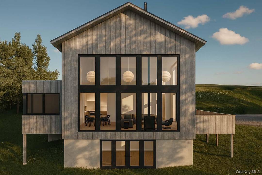 Set on a serene two acre parcel that spans both sides of a quiet country road, this exceptional new residence, scheduled for completion in December 2025, offers a rare blend ...