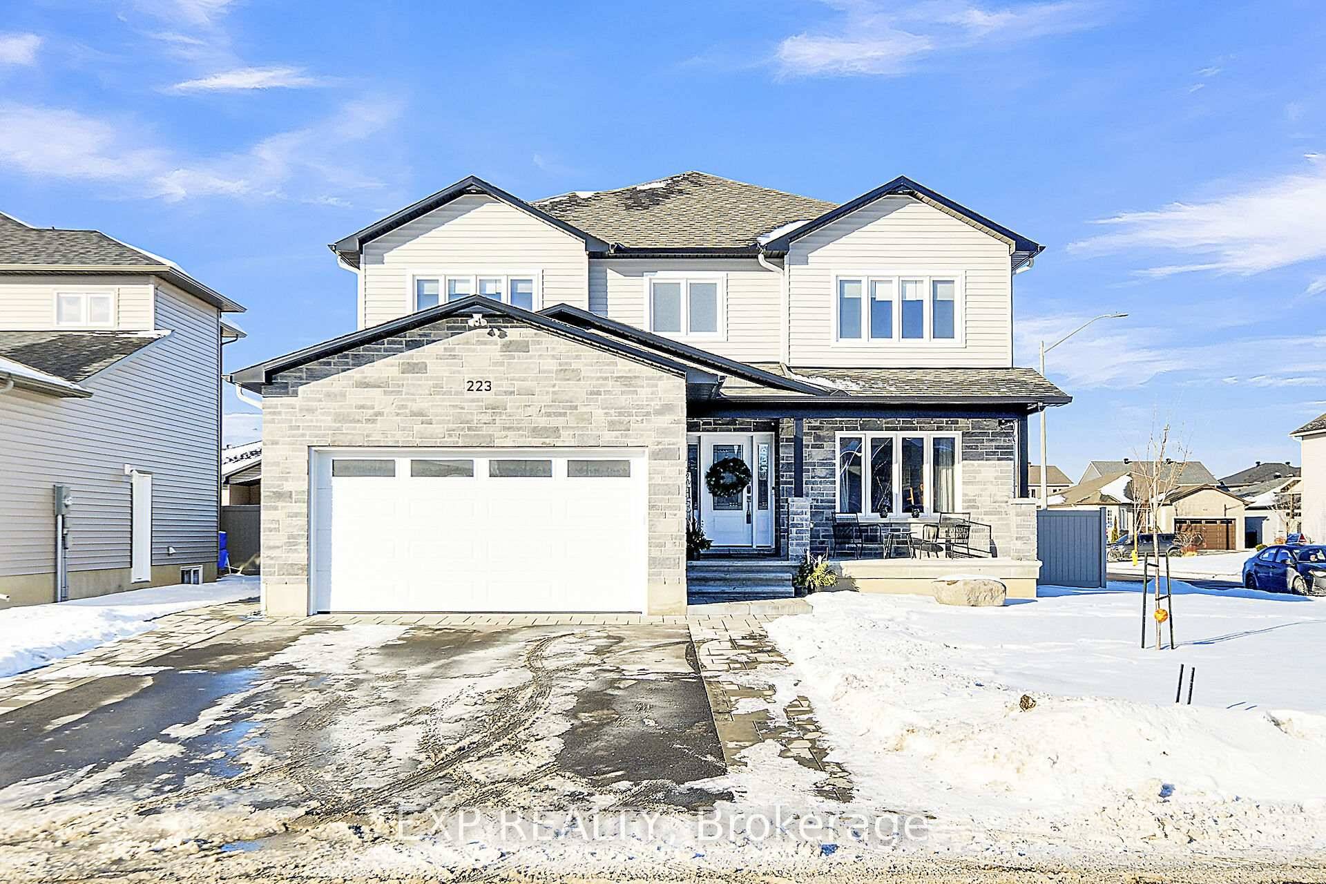 Welcome to 223 Station Trail, This Garnet model was designed by award winning Builder Corvinelli Homes with large and multi generational families in mind.
